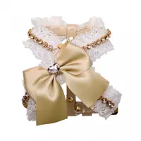 Ham elegant, crem, decorat cu dantela si lantisor din cristale Swarovski, cu funda din satin, dimensiune XXS