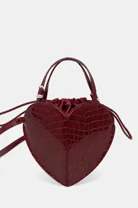 Rotate geantă crossbody pentru femei din piele