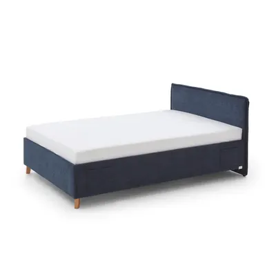 Pat pentru copii albastru închis tapițat cu spațiu de depozitare cu somieră 140x200 cm Fun – Meise Möbel