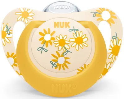 Suzeta din silicon Nuk - Star, peste 18 luni, galbena cu flori