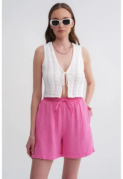 Pantaloni scurți din bumbac texturat - Roz pudrat