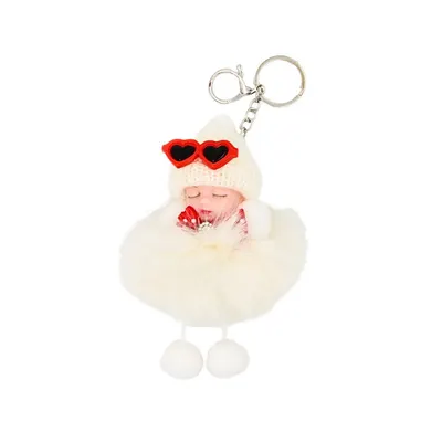 Breloc puf bej model bebeluș adormit