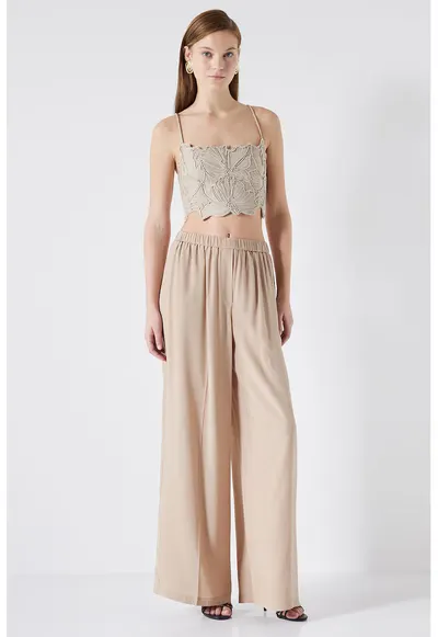 Pantaloni cu croiala ampla si talie elastica - Maro camel
