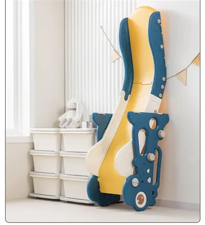 Tobogan pentru copii Nichiduta Garden Dinosaur Blue, cu mini-cos de Baschet si joc de precizie cu inele, prevazut cu scara, manere de sustinere, design pliabil, dimensiune 150 x 67.5 cm