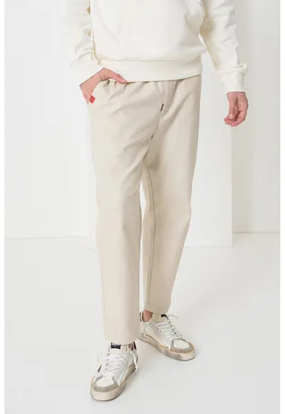 Pantaloni conici de bumbac - Alb fildes