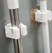 Set 2 bucati suport de perete pentru mop si maturi universal