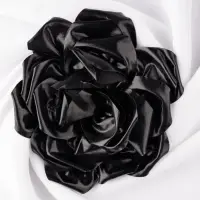 Brosa floare cu diametru de 15 cm, cu clips pentru par, negru metalizat