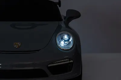 Masinuta electrica pentru copii Porsche RUF CTR3 Blue 70w cu licenta,echipare premium,roti EVA,scaun din piele,oglinzi retrovizoare,lumini LED,muzica,bluetoothUSB,suspensii,cod QR video asamblare,afisaj baterie,Eleron