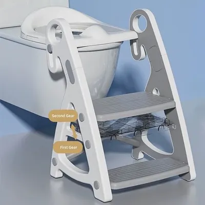 Reductor WC copii Little Mom StepUp Baby Pink, reglabil pe inaltime, cu manere ergonomice, colac moale detasabil din spuma PU, design anti-stropire, compatibilitate universala