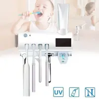 Dozator pentru pasta de dinti cu sterilizator UV pentru periute