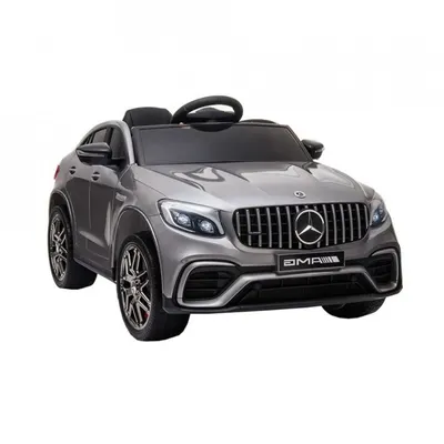Masinuta electrica pentru copii Novokids Mercedes GLC 63 AMG Gri, 12V, roti din cauciuc EVA, 3-8 ani, usi cu deschidere, 2 viteze, lungime 115 cm, 2 motoare 390 W