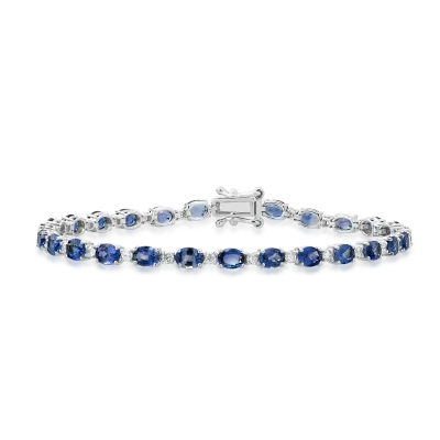 Bratara tennis din aur alb cu safire albastru deschis ovale de 6.25ct si diamante de 0.6ct