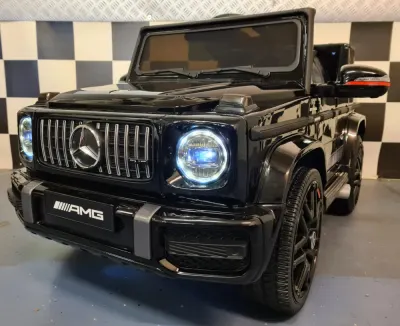 Masinuta electrica pentru copii Mercedes G63 AMG Negru, 12V, licenta oficiala, 4 motoare, telecomanda 2.4G