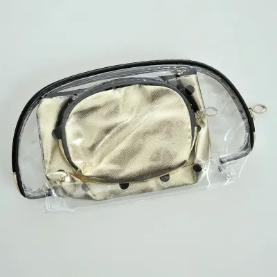 Geanta cosmetica aurie cu buline negre