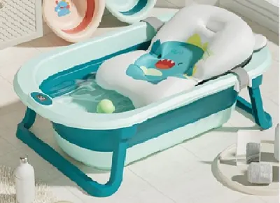Cadita bebelusi pliabila Little Mom Dino Blue, include o perna de siguranta detasabila, termometru cu display digital,protectie anti-alunecare, 87x51x23 cm