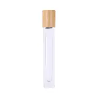 Sticluță transparentă reutilizabilă cu roll-on metalic și capac bambus - 10ml
