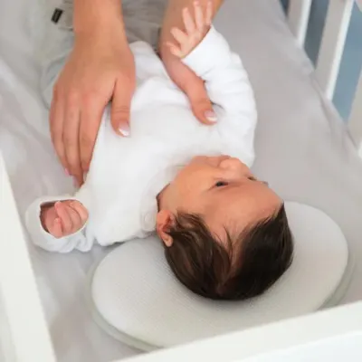 Perna ergonomica Doomoo pentru capul bebelusului