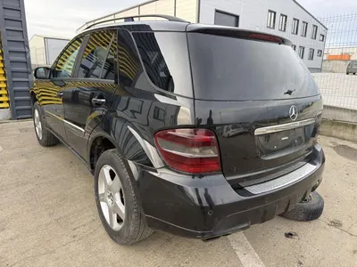 Aripa spate stanga culoare 197 - negru obsidian Mercedes ML (2006-2011)[w164]