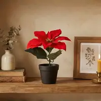 Plantă artificială Crăciuniță 20 cm, cu petale roșii textile cu textura catifelată și frunze verzi, în ghiveci negru