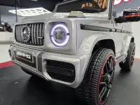 Masinuta electrica pentru copii Mercedes G63 AMG Gri Metalic, 12V, licenta oficiala, 4 motoare, telecomanda 2.4G