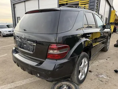 Aripa spate dreapta culoare 197 - negru obsidian Mercedes ML (2006-2011)[w164]
