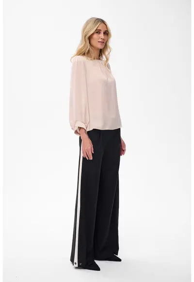 Pantaloni cu croiala ampla si buzunare Foresti