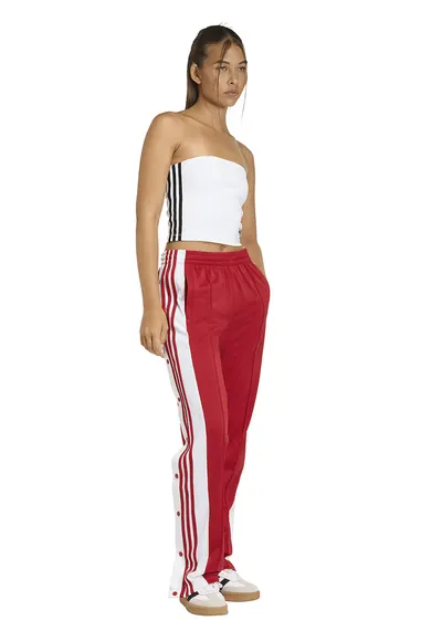 Pantaloni de trening relaxed fit cu capse laterale Adibreak - Rosu/Alb
