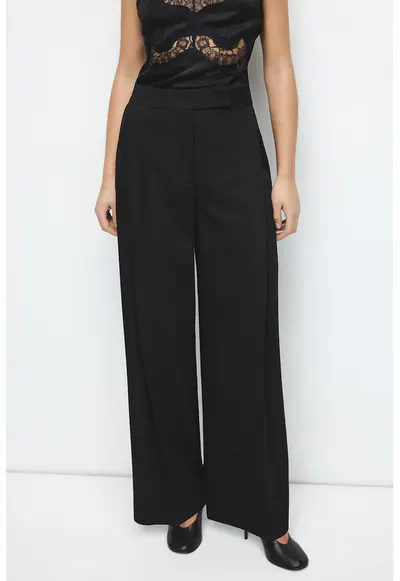 Pantaloni cu croiala ampla si buzunare laterale - Negru