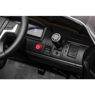 Masinuta electrica pentru copii Toyota Landcruiser Red cu roti EVA, scaun din piele, deschidere usi, scaun piele si telecomanda