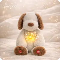 Jucarie din plus senzoriala, Primabobo, Catelus, 36 cm, Cu lumini ce simuleaza respiratia, Senzor pentru plans, Inregistrare vocala, Temporizator, 6 luni+, Bej