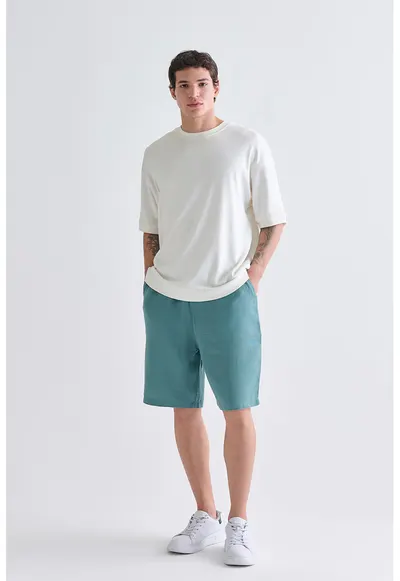 Pantaloni scurti relaxed fit din bumbac cu buzunar aplicat pe spate - Albastru teal