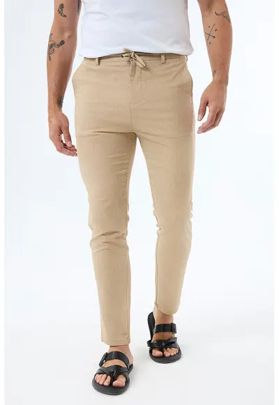 Pantaloni slim fit din amestec de bumbac si in - Bej
