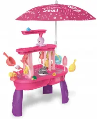 Set masa interactiva de apanisip 2in1 cu umbrela si cascada electrica Matadi Waterfall Pink cu jucarii incluse,moara de apa,cascada,lansator de mingii si figurine