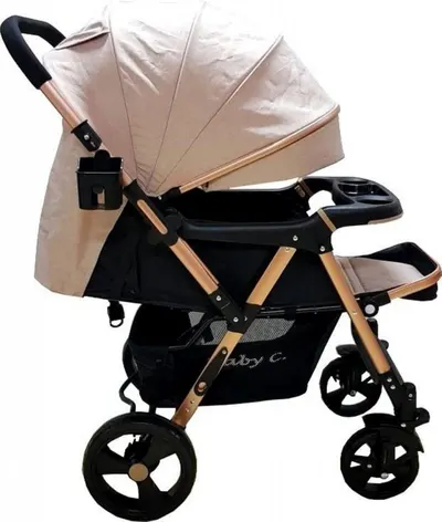Carucior pentru copii Baby Care PRO 511 Crem, Cadru aluminiu, Maner reversibil, Spatar reglabil 5 trepte, Amortizoare, Frana picior