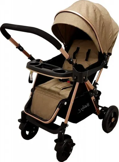 Carucior pentru copii Baby Care PRO 511 Maro, Cadru aluminiu, Maner reversibil, Spatar reglabil in 5 trepte, Amortizoare, Frana picior, Pliabil