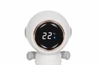 Termometru 3 in 1 Colibro, pentru baie, camera si jucarie, cu display LED, model Cosmonaut cu brate mobile, dimensiune 5.5 x 7 cm