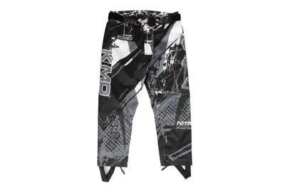 Pantaloni KIMO Kids BRO Motocross cu aparatori, ideal pentru copii pasionati de motocross, negru