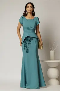 Rochie lunga turcoaz de ocazie cu croi sirena si aplicatii florale sub peplum