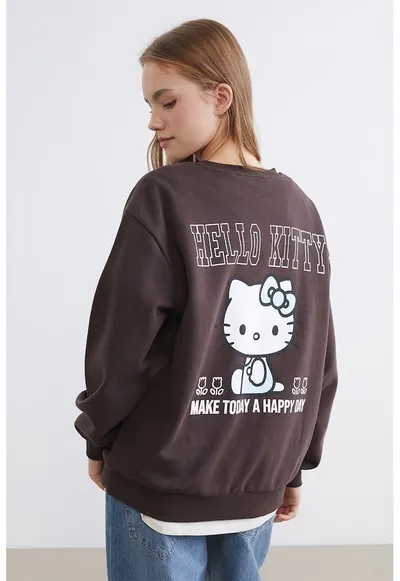 Bluza de trening din amestec de bumbac cu imprimeu Hello Kitty - Albastru pastel/Maro inchis/Alb optic