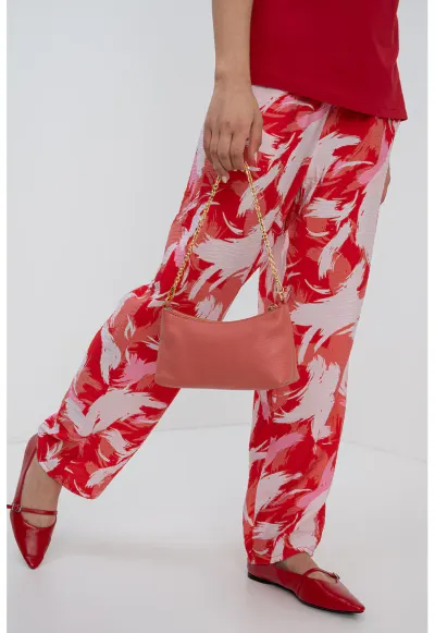 Pantaloni relaxed fit cu imprimeu grafic - Roz deschis/Rosu vermillion