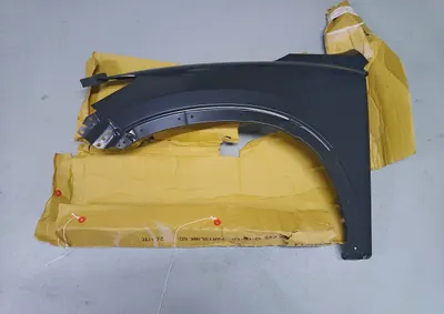 Aripa Stanga potrivit MAZDA CX-5 dupa 2011 Resigilat - (cu orificii ornament, otel)