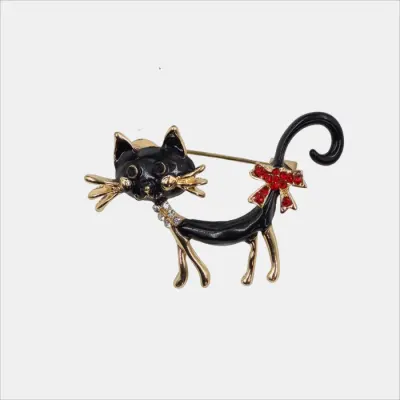 Brosa eleganta pisica neagra din metal cu strasuri rosii