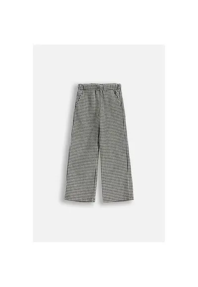 Pantaloni largi cu model in carouri