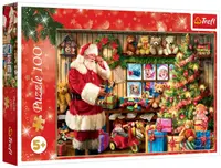 Puzzle Trefl din 100 piese - Moș Crăciun lângă bradul de Crăciun
