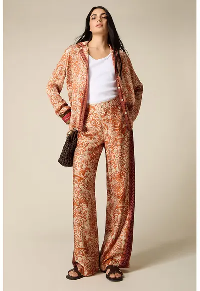 Pantaloni cu croiala ampla si imprimeu floral - Portocaliu pal