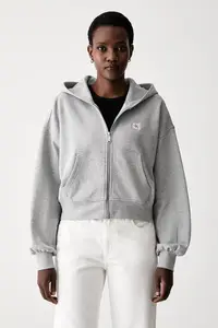 Calvin Klein Jeans hanorac cu fermoar și glugă pentru femei din bumbac