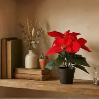 Plantă artificială Crăciuniță 28 cm, cu petale roșii textile cu textura catifelată și frunze verzi, în ghiveci negru