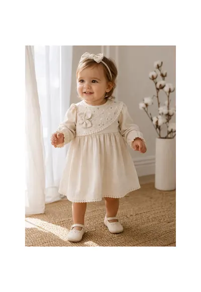 Rochita bebe fetita cu bentita din muselina eleganta crem