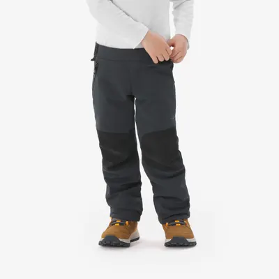 Pantalon Drumeție la munte MH900 Softshell Negru Băieți 2-6 ani