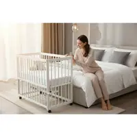 Patut co-sleeper Qmini Dalia Alb, multifunctional, 90x50 cm, din lemn de pin, reglabil pe orice treapta de inaltime la patul parintilor, sistem de ancorare si roti cu frana incluse